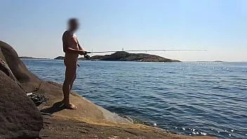 Play Naked public fishing on the nude beach